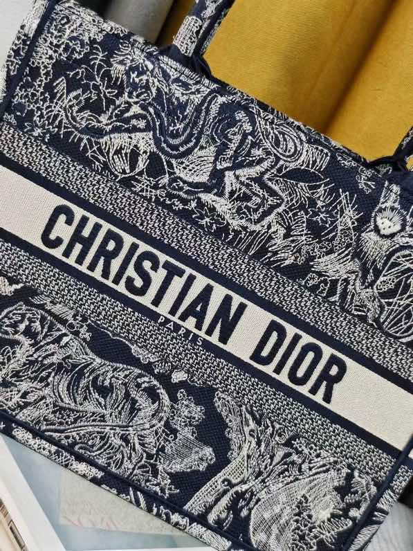 large D*or book tote blue and ecru toile de jouy reverse embroidery 16.5 x 14 x 7.5 inches