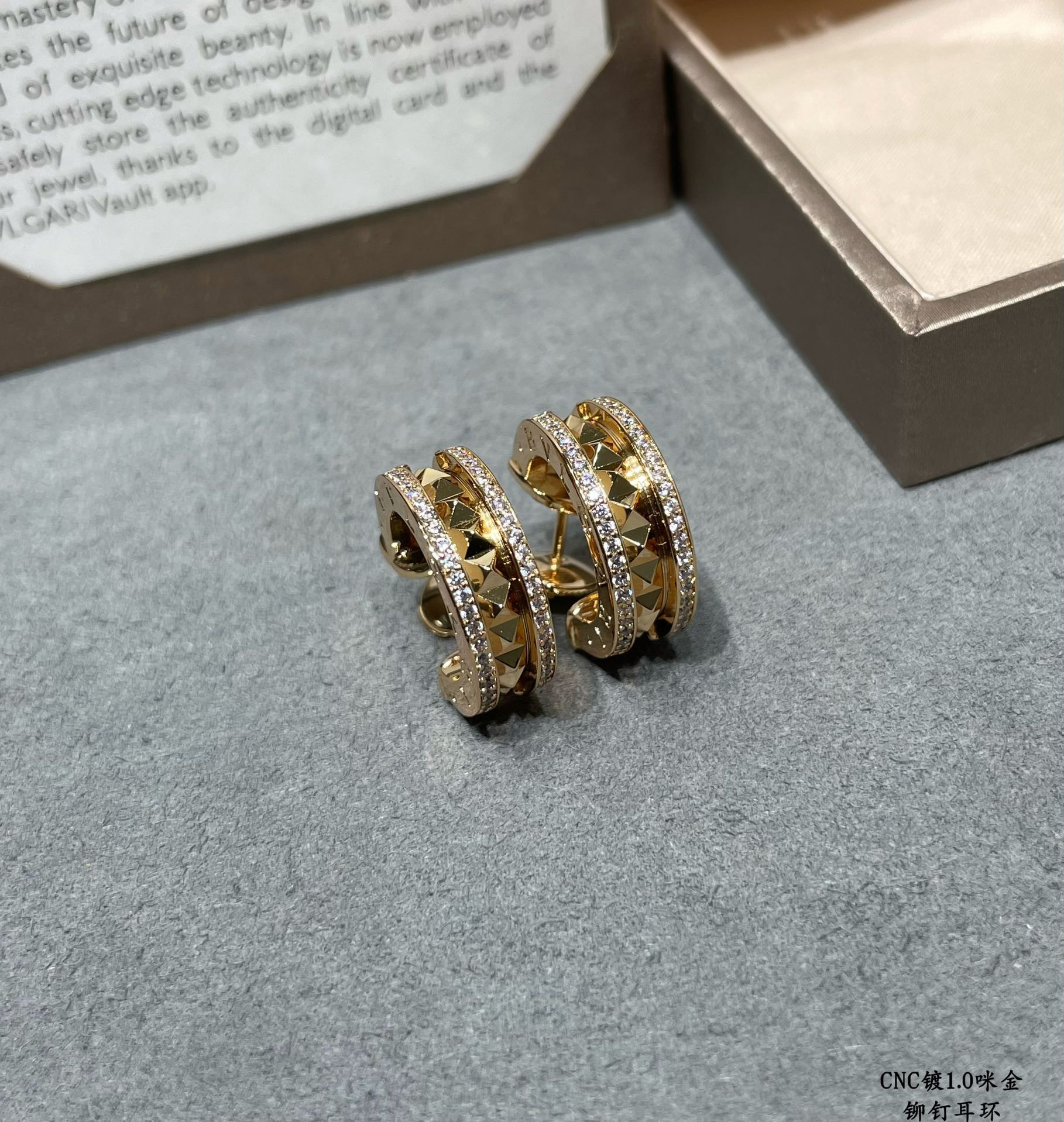 B*l*ai drill rivets on both sides earrings