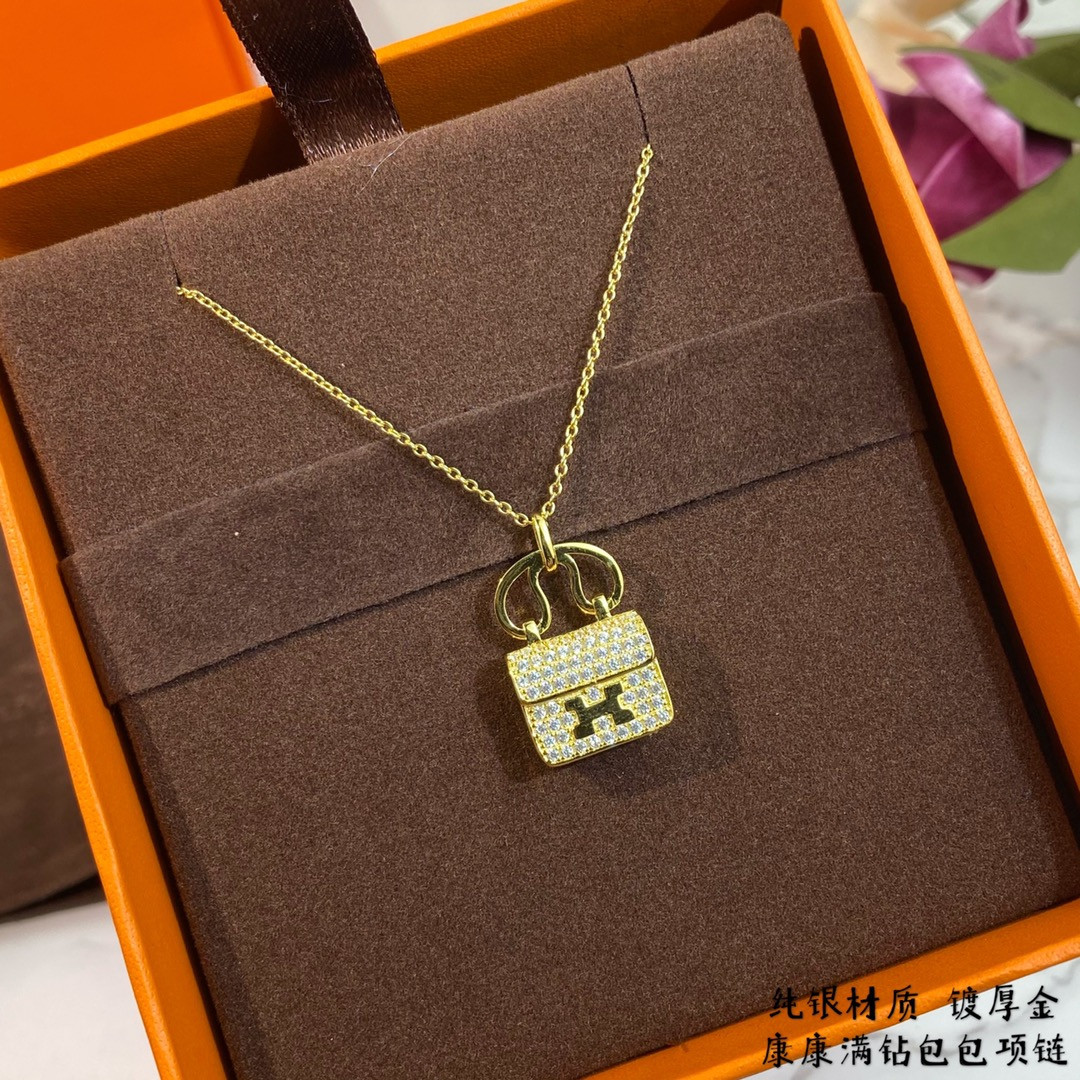 H**me5 fully di*m*nd-encrusted h bag necklace