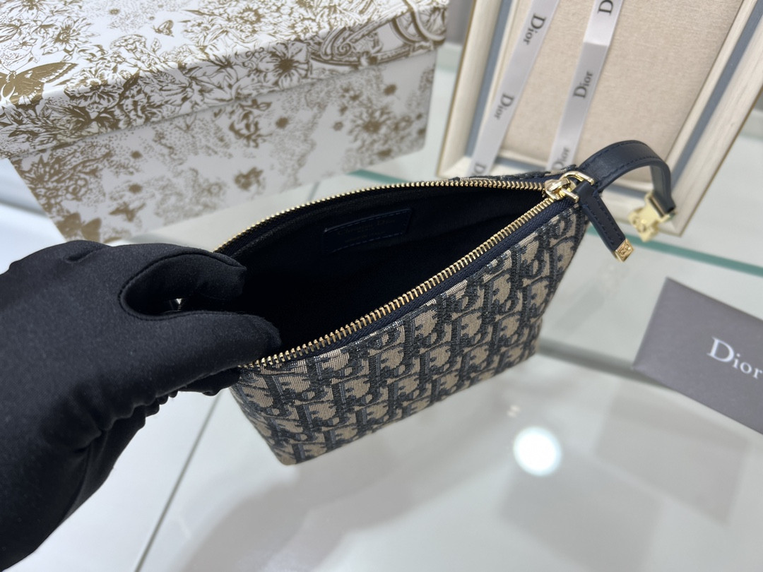 D*or travel nomad pouch blue D*or oblique jacquard