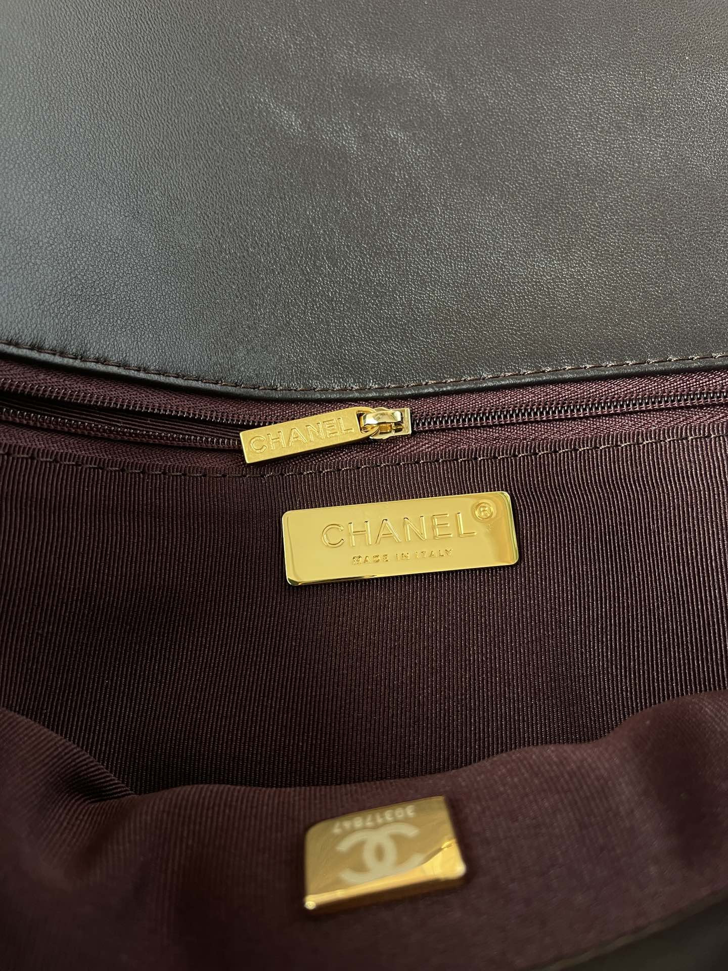 Ch*el 19 large handbag shiny leather, gold-tone, silver-tone & ruthenium-finish metal black 7.8 × 11.7 × 3.9 in