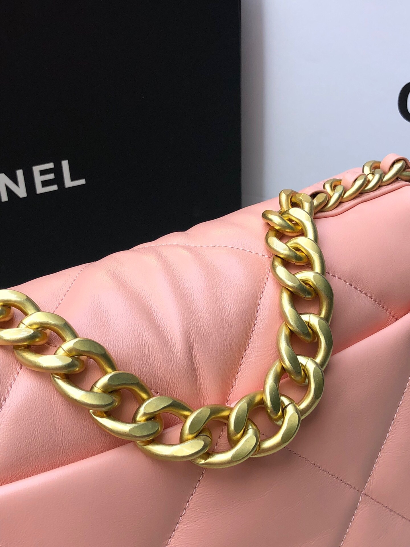 Ch*el 19 large handbag shiny leather, gold-tone, silver-tone & ruthenium-finish metal light pink 7.8 × 11.7 × 3.9 in