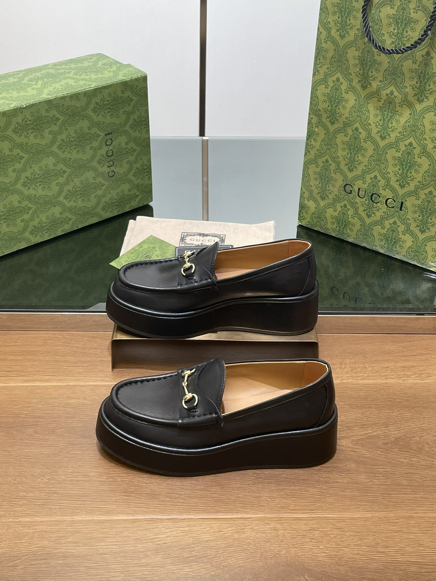 ua G*u*i horsebit wedge loafer